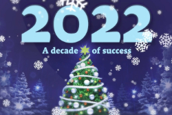 Text that says 2022 in blue writing with a christmas tree under it