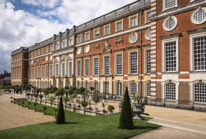 Facade and gardens at Hampton Court Palace.