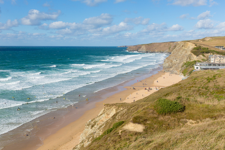 Watergate Bay Cornwall England UK Cornish north coast between Newquay and Padstow on a sunny blue sky day popular surfing beach