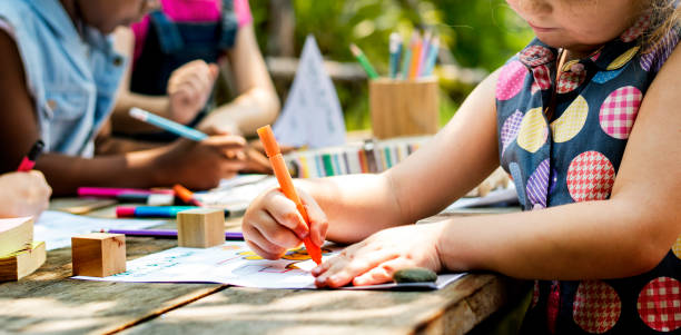 Group of children colouring in