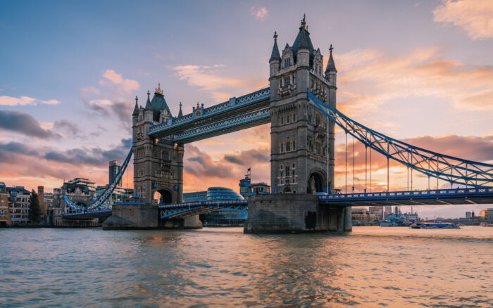 London Tower Bridge with the sun setting behind the clouds